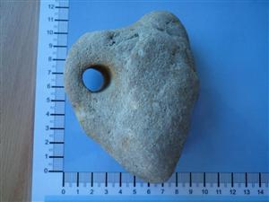 Tarmac_0317: Fishing Weight and Fossil